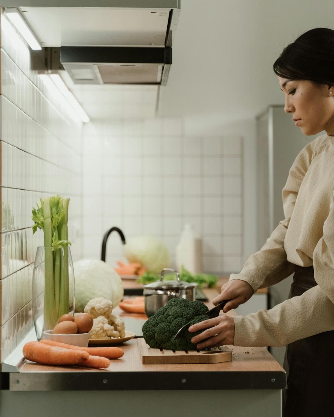 A person preparing a healthy, macro-friendly meal